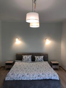 Llit o llits en una habitació de Wide and comfortable Spa House Sea 3 min