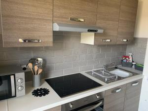 Kuhinja ili čajna kuhinja u objektu Apartment Armstrong