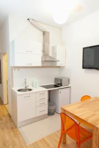 Kuchyň nebo kuchyňský kout v ubytování Apartment Stara vrata