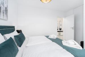 Łóżko lub łóżka w pokoju w obiekcie Apartament DIAMOND