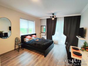 Ένα ή περισσότερα κρεβάτια σε δωμάτιο στο Apartment STILVOLL Marienbad