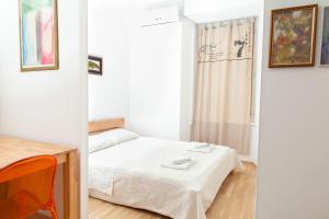 Postel nebo postele na pokoji v ubytování Apartment Stara vrata