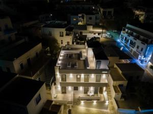an aerial view of a house at night at Bedspot Apartments Astipalaia in Pera Gyalos +68 photos