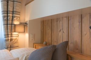Postel nebo postele na pokoji v ubytování Hotel La Romantica