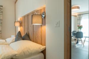 Postel nebo postele na pokoji v ubytování Hotel La Romantica