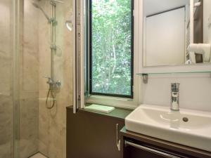 A bathroom at Cottage on the edge of the fishing pond