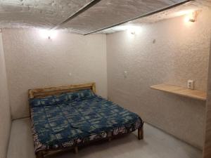 Postel nebo postele na pokoji v ubytování Krone Hostel