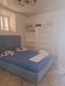 Postel nebo postele na pokoji v ubytování Prinilas manor