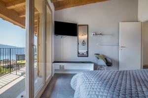 Postel nebo postele na pokoji v ubytování Casa Panoramica