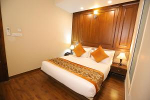 Postel nebo postele na pokoji v ubytování IP Royal Hotel - New Delhi + 37 fotografií