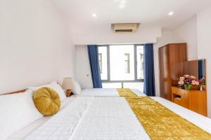 Ένα ή περισσότερα κρεβάτια σε δωμάτιο στο Hanoi View Legend Hotel