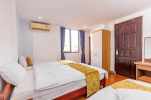 Ένα ή περισσότερα κρεβάτια σε δωμάτιο στο Hanoi View Legend Hotel