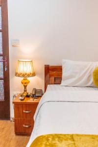 Ένα ή περισσότερα κρεβάτια σε δωμάτιο στο Hanoi View Legend Hotel
