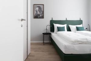 Posteľ alebo postele v izbe v ubytovaní Apartments Iris