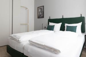 Posteľ alebo postele v izbe v ubytovaní Apartments Iris