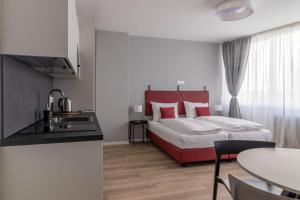 Posteľ alebo postele v izbe v ubytovaní Apartments Iris