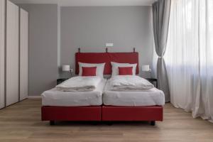 Posteľ alebo postele v izbe v ubytovaní Apartments Iris