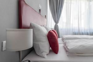 Posteľ alebo postele v izbe v ubytovaní Apartments Iris