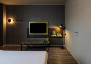 Postel nebo postele na pokoji v ubytování Hotel Mealba