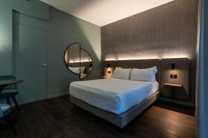 Postel nebo postele na pokoji v ubytování Hotel Mealba