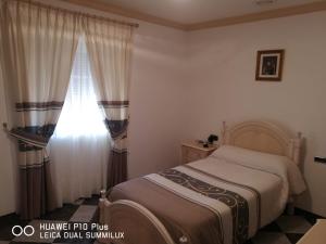 Postel nebo postele na pokoji v ubytování Casa José Romero