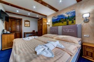 Posteľ alebo postele v izbe v ubytovaní Wellness Resort Kamzík