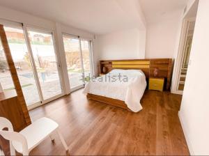 A bed or beds in a room at Private Pool in Villa near the Beach