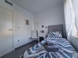 Postel nebo postele na pokoji v ubytování 4 Bedroom Villa Private Pool Punta Prima
