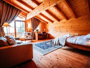 Photo de la galerie de l'établissement Hideway Chalet Gamsglück with pool and sauna, à Waidring