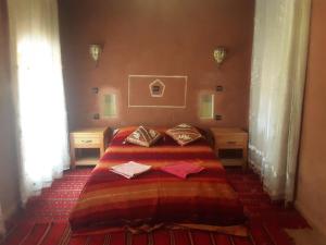 Postel nebo postele na pokoji v ubytování Kasbah Petit Nomade