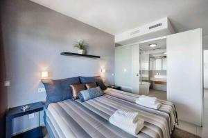 Posteľ alebo postele v izbe v ubytovaní HigueronRentals Bahia