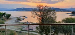 a view of a body of water at sunset at Anny's studio in Chalkida