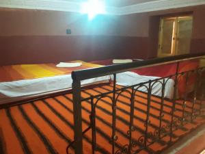 Postel nebo postele na pokoji v ubytování Kasbah Petit Nomade