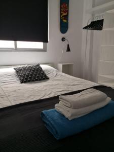 A bed or beds in a room at My quiet house