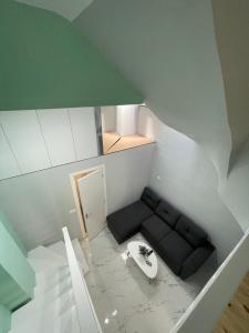 an overhead view of a room with a couch at John's Minimal Loft in Agios Nikolaos