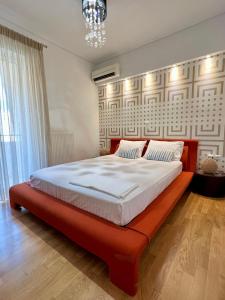 מיטה או מיטות בחדר ב-Helen Luxury Loft Design MEISONETTE-APARTMENT