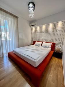 מיטה או מיטות בחדר ב-Helen Luxury Loft Design MEISONETTE-APARTMENT