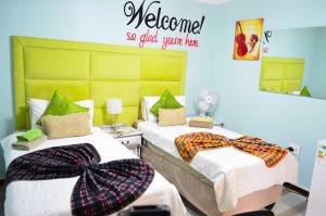 Postel nebo postele na pokoji v ubytování Unathi Guest Lodge