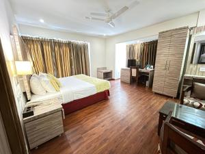 Voodi või voodid majutusasutuse Surasena Regal Vista Agra toas