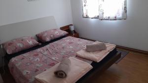Postel nebo postele na pokoji v ubytování Rooms Ma La
