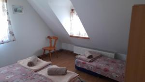 Postel nebo postele na pokoji v ubytování Rooms Ma La