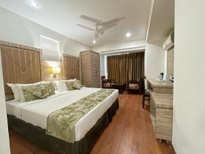Voodi või voodid majutusasutuse Surasena Regal Vista Agra toas