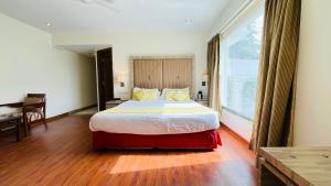 Voodi või voodid majutusasutuse Surasena Regal Vista Agra toas
