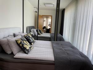 Tempat tidur dalam kamar di Penthouse Kadriorg