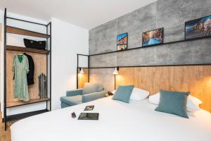 Katil atau katil-katil dalam bilik di ibis Lyon Sud Oullins