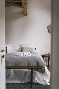 Кровать или кровати в номере Tomette Singulière