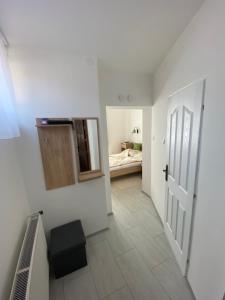 Posteľ alebo postele v izbe v ubytovaní RÁD-VÁR Apartmanház