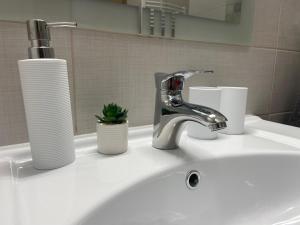 Kúpeľňa v ubytovaní RÁD-VÁR Apartmanház