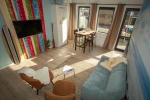 TV a/nebo společenská místnost v ubytování Bed & Breakfast Bakker Meijer