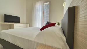 TV a/nebo společenská místnost v ubytování La Corte dei Colombi - GUEST HOUSE